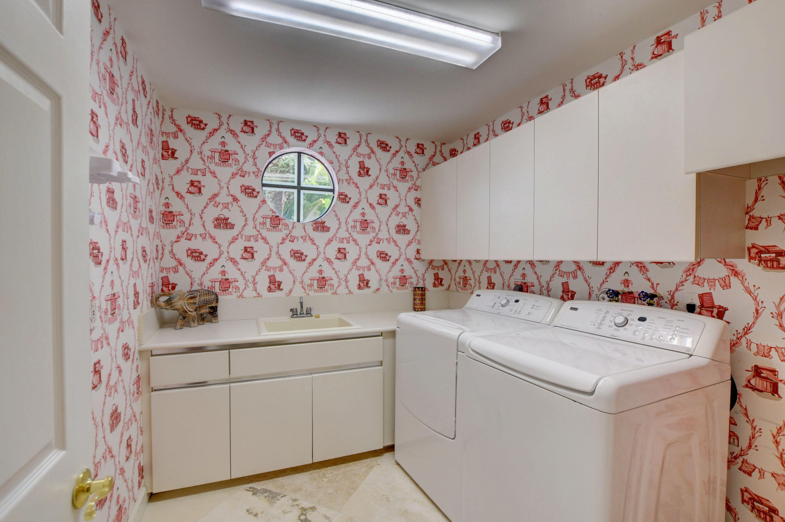 6174 Northwest 24th Way Boca Raton, FL 33496 - Photo 45 of 58 a utility room with dryer and washer