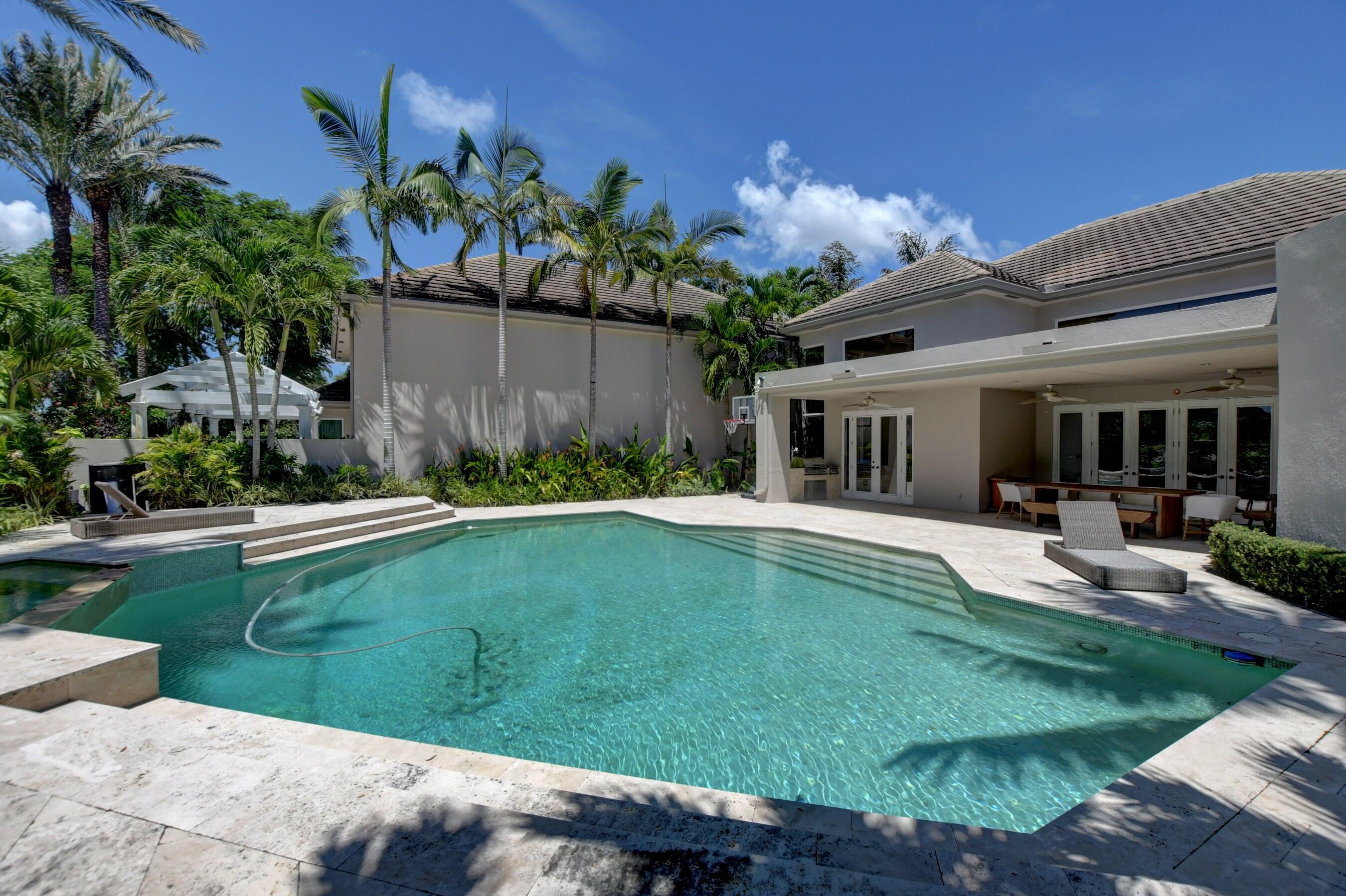 6174 Northwest 24th Way Boca Raton, FL 33496 - Photo 50 of 58 a view of a house with backyard and sitting area