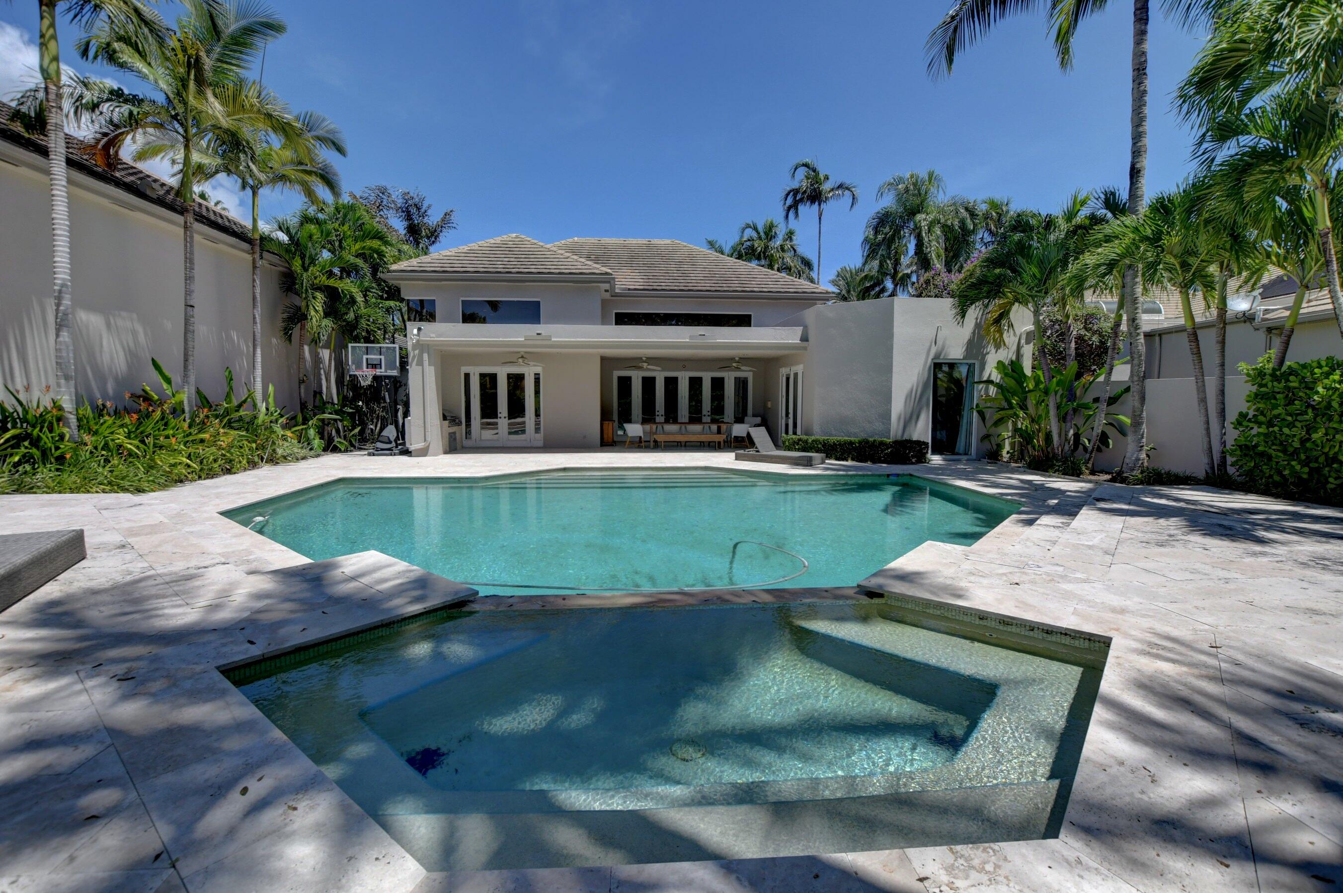 6174 Northwest 24th Way Boca Raton, FL 33496 - Photo 52 of 58 a view of a house with a yard