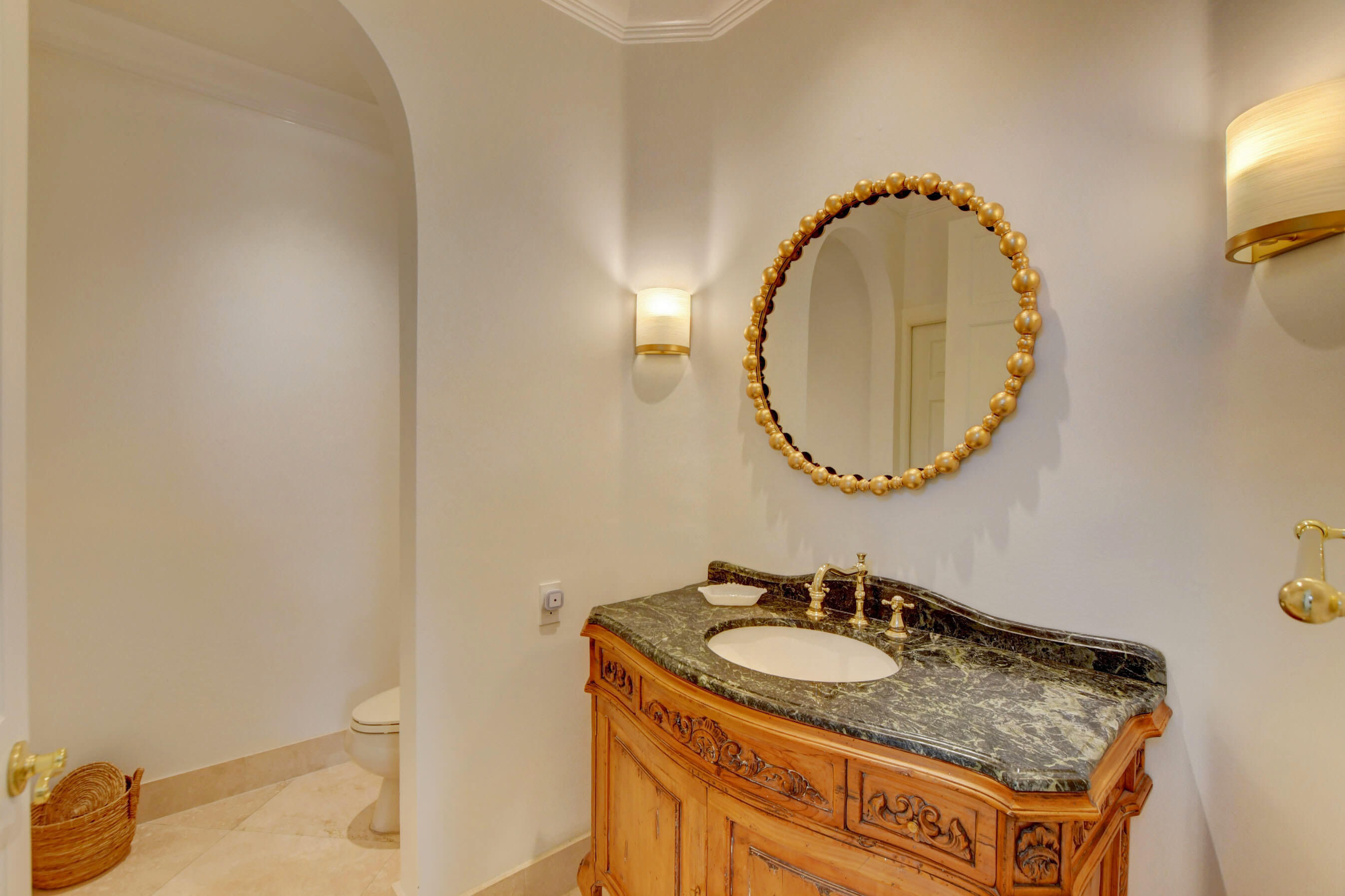 6174 Northwest 24th Way Boca Raton, FL 33496 - Photo 6 of 58 a bathroom with a sink and a mirror