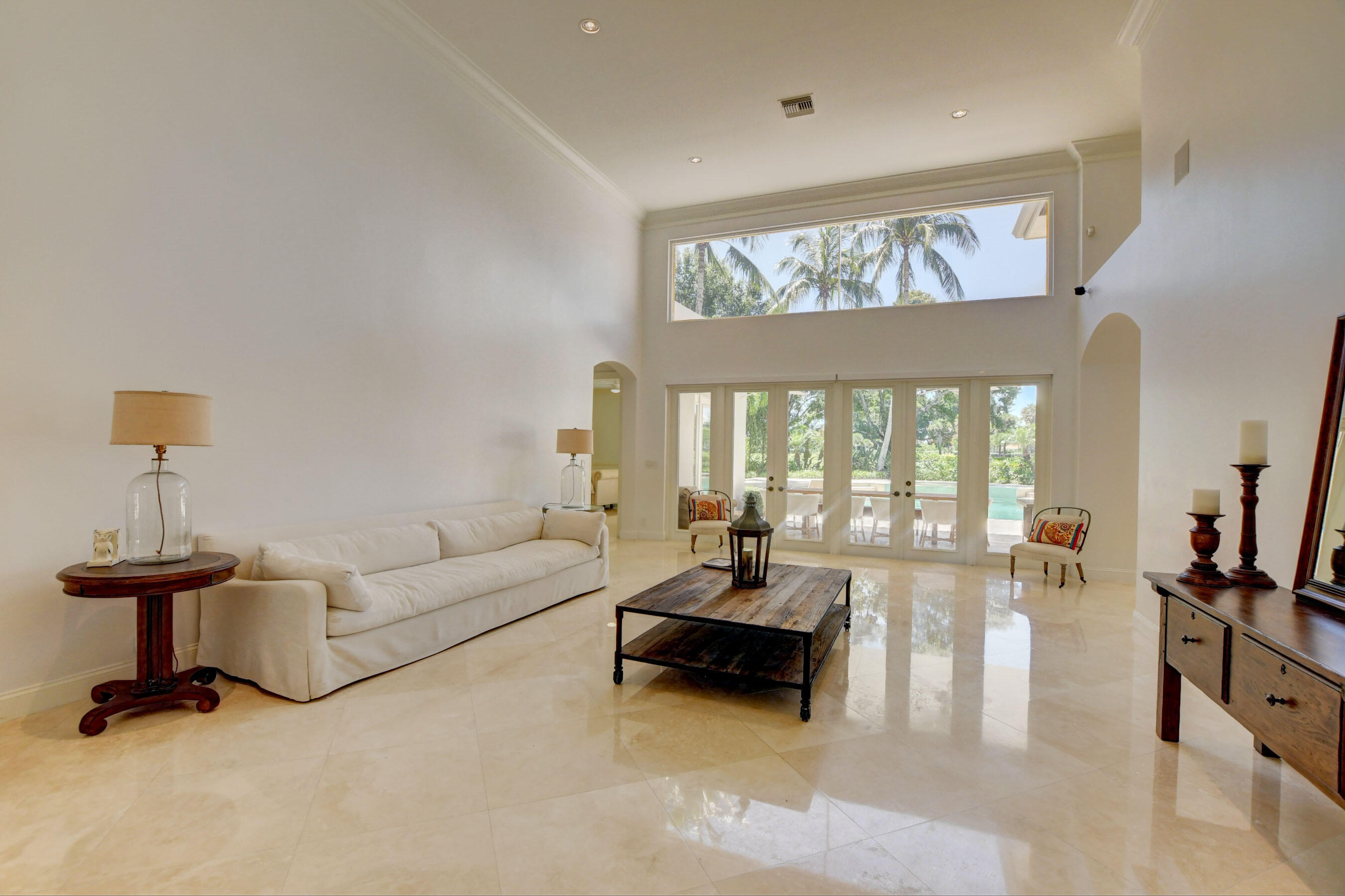 6174 Northwest 24th Way Boca Raton, FL 33496 - Photo 7 of 58 a living room with furniture and a large window