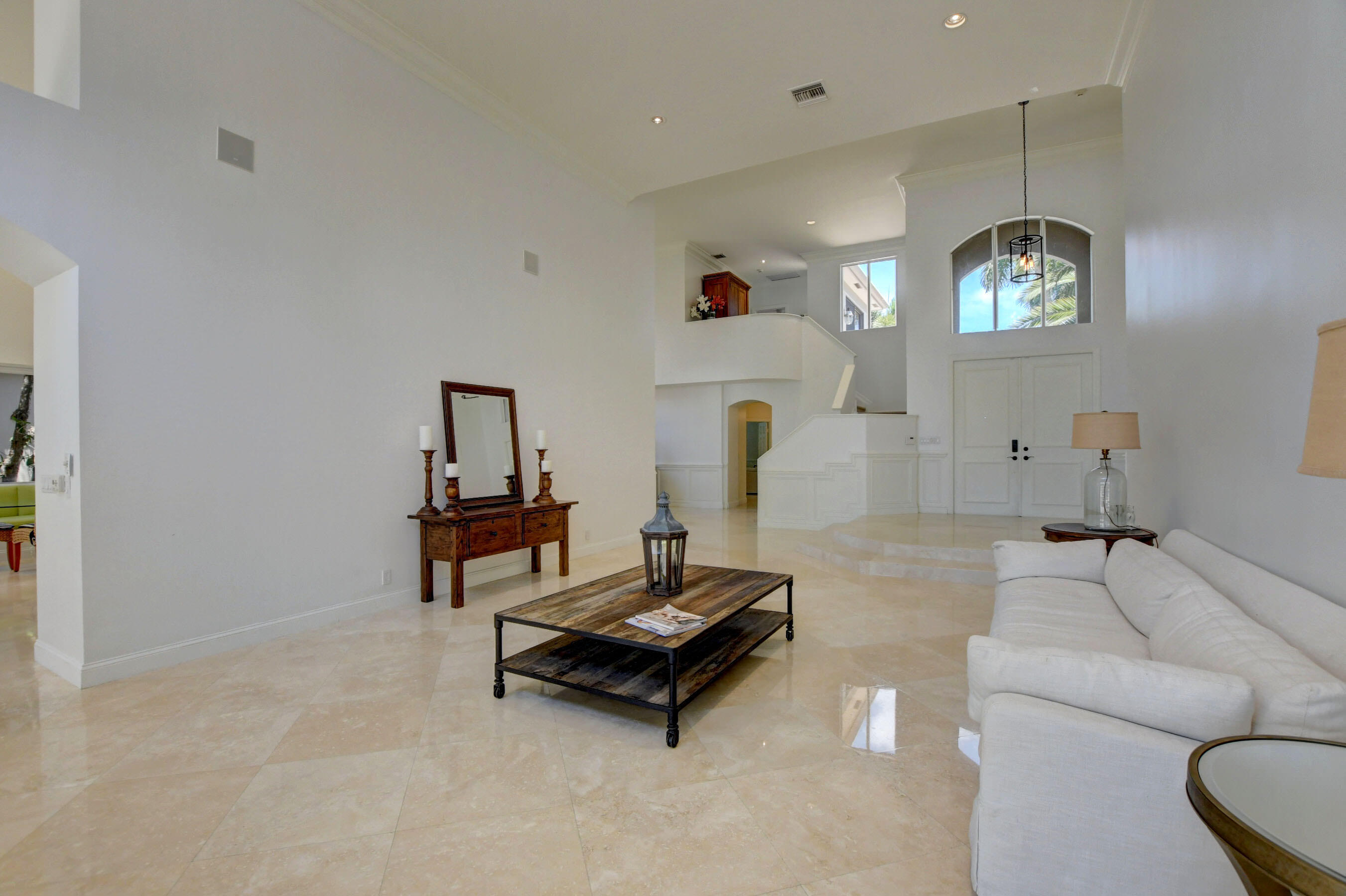 6174 Northwest 24th Way Boca Raton, FL 33496 - Photo 10 of 58 a living room with furniture and a table