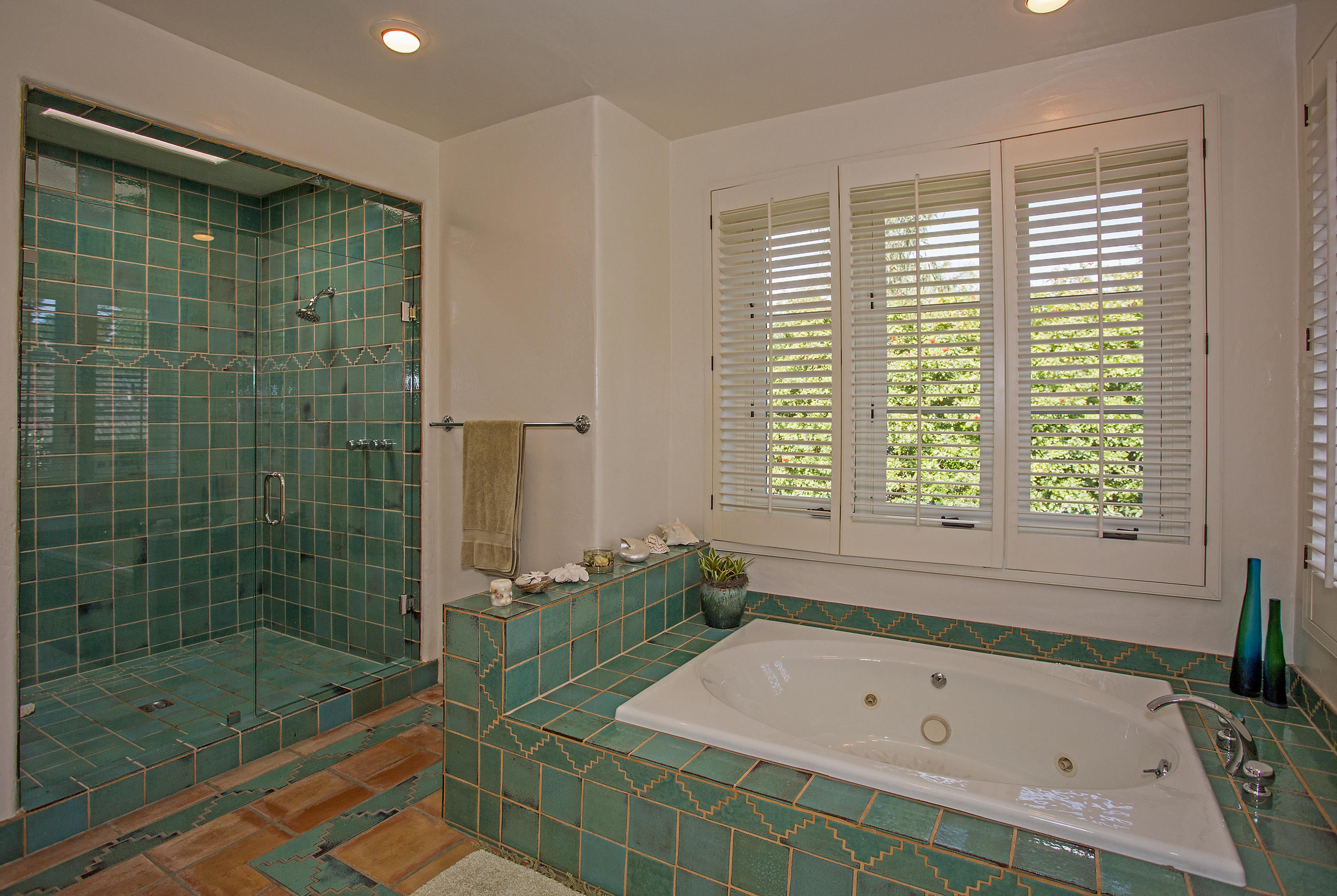 1420 East Valley Road Montecito, CA 93108 - Photo 11 of 17 a bathroom with a bathtub and a shower