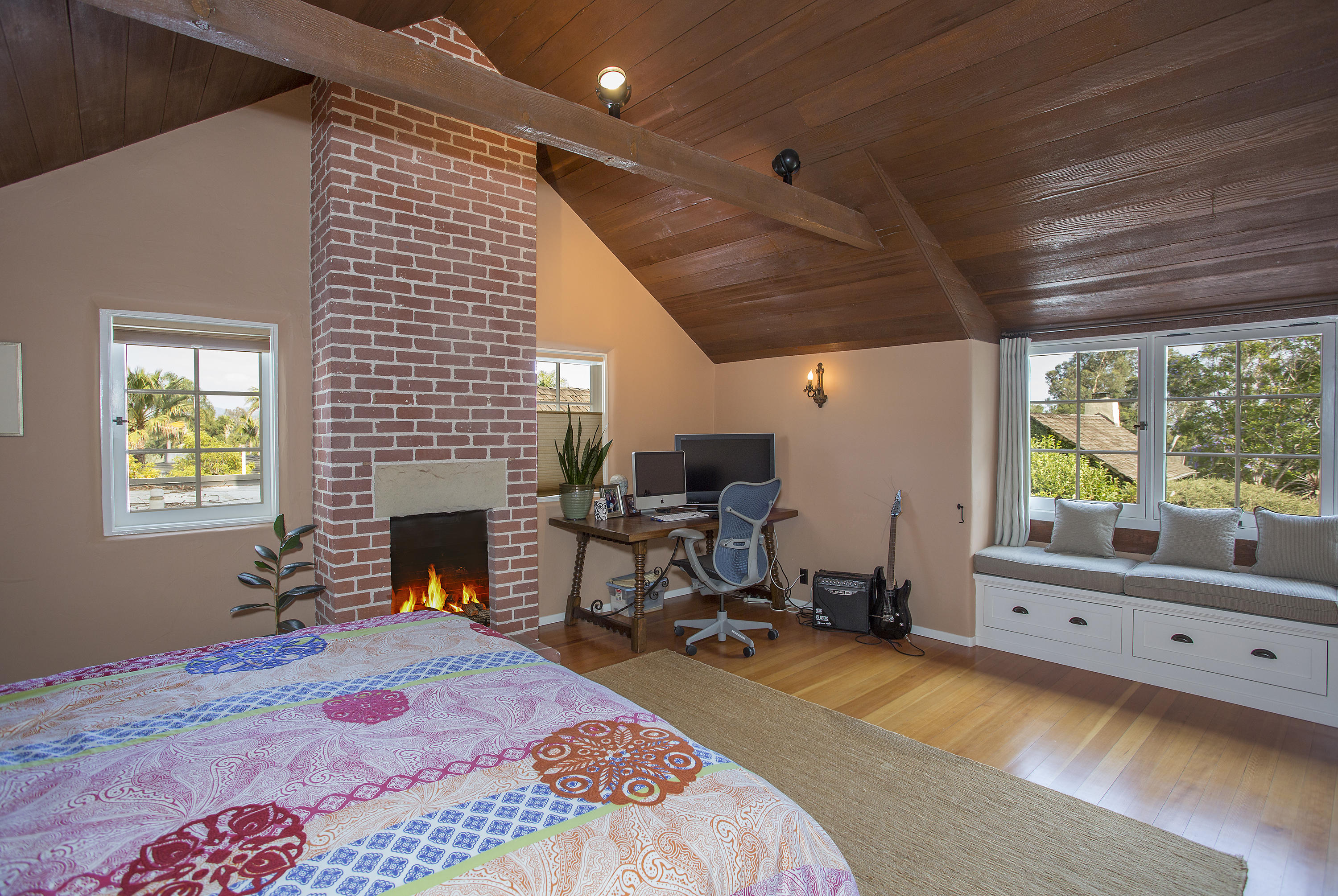 1420 East Valley Road Montecito, CA 93108 - Photo 15 of 17 a bedroom with a bed and wooden floor