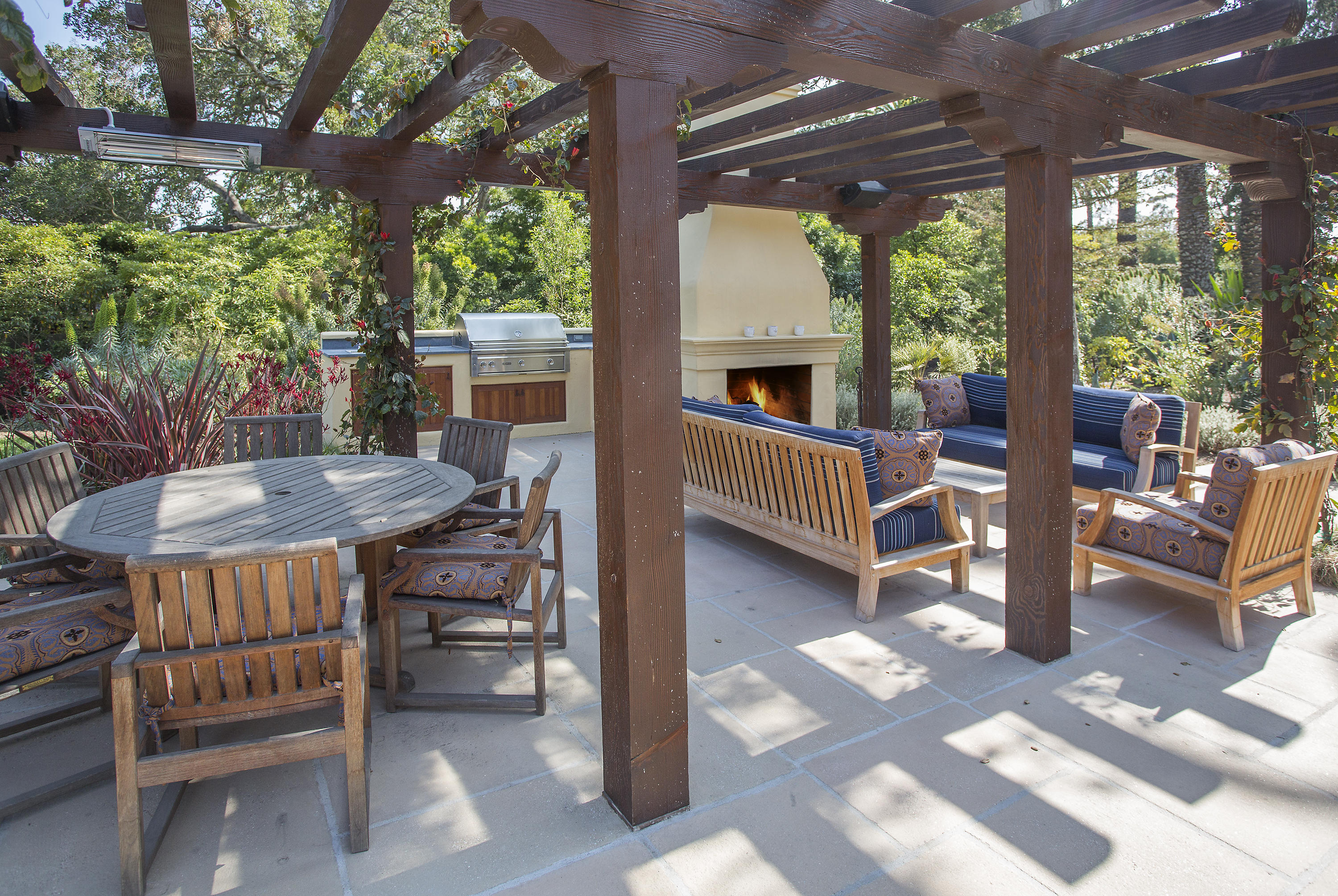 1420 East Valley Road Montecito, CA 93108 - Photo 5 of 17 a view of a patio with a table and chairs