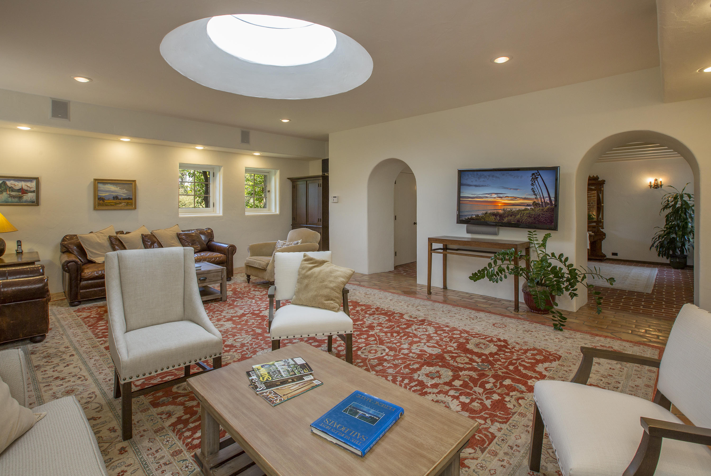 1420 East Valley Road Montecito, CA 93108 - Photo 8 of 17 a living room with furniture and a flat screen tv