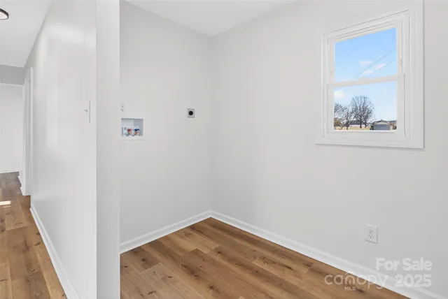 a view of a hallway with closet