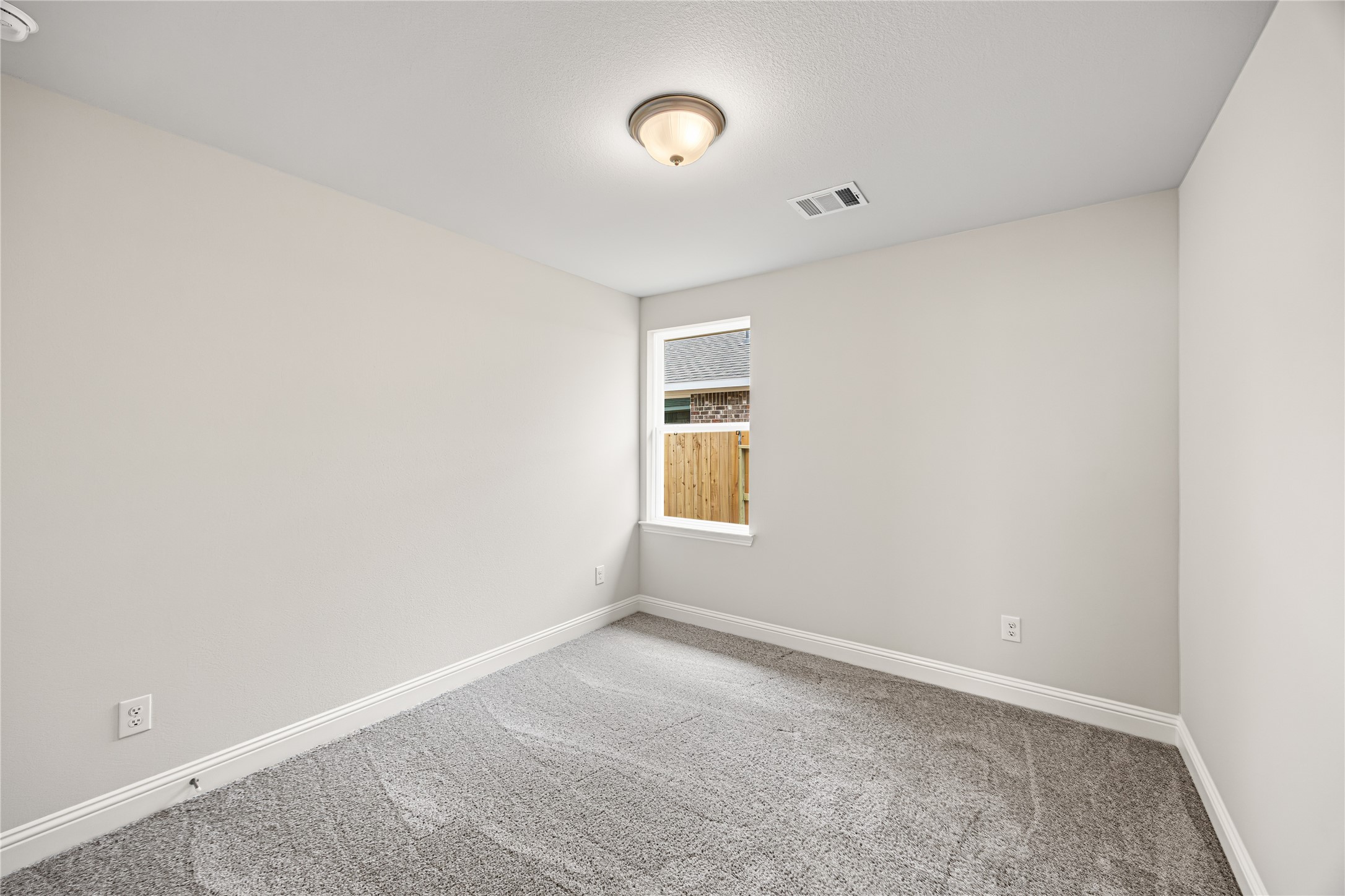 9476 Hard Rock Road Conroe, TX 77303 - Photo 11 of 13 a view of room and window