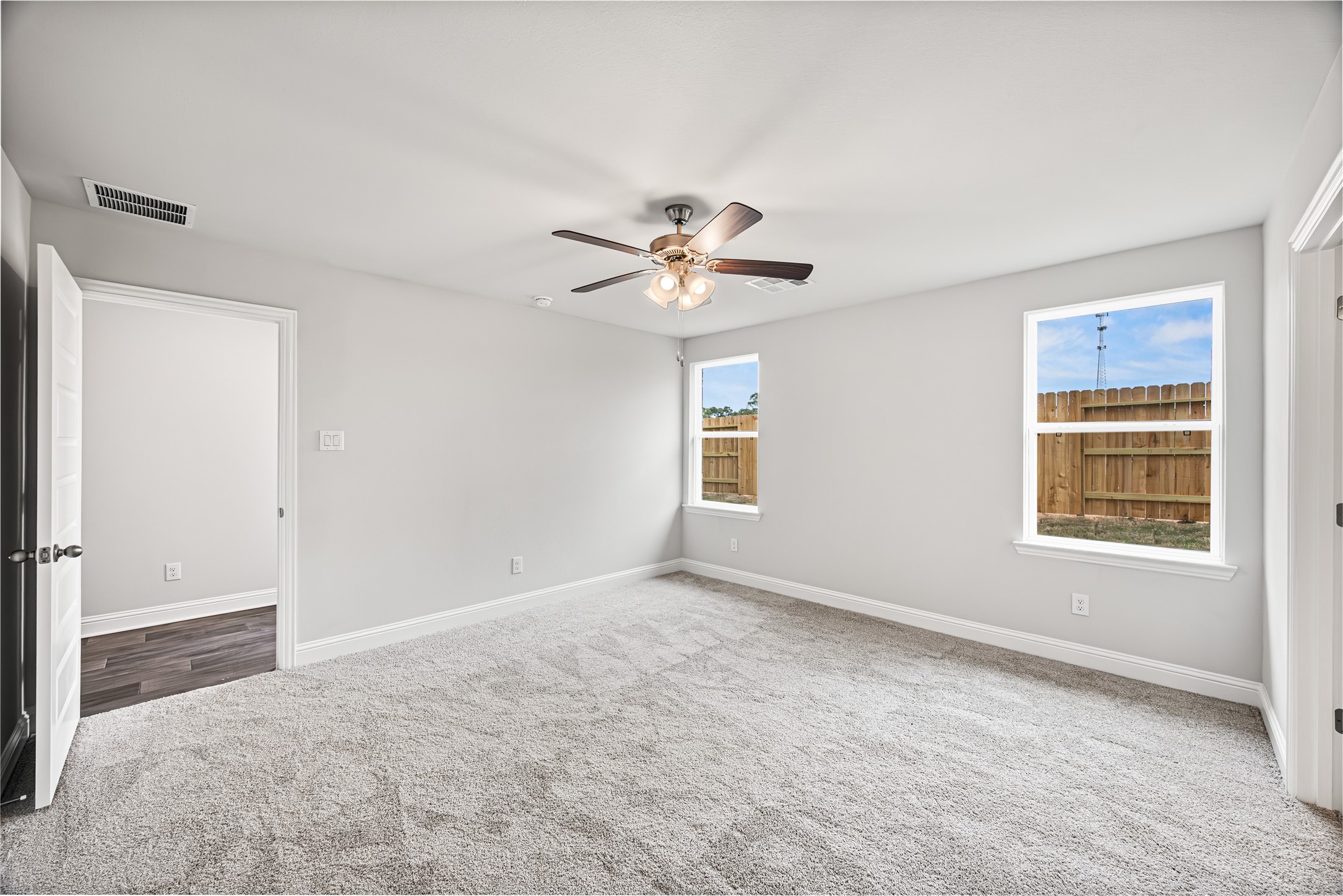 9476 Hard Rock Road Conroe, TX 77303 - Photo 6 of 13 a view of an empty room with a window
