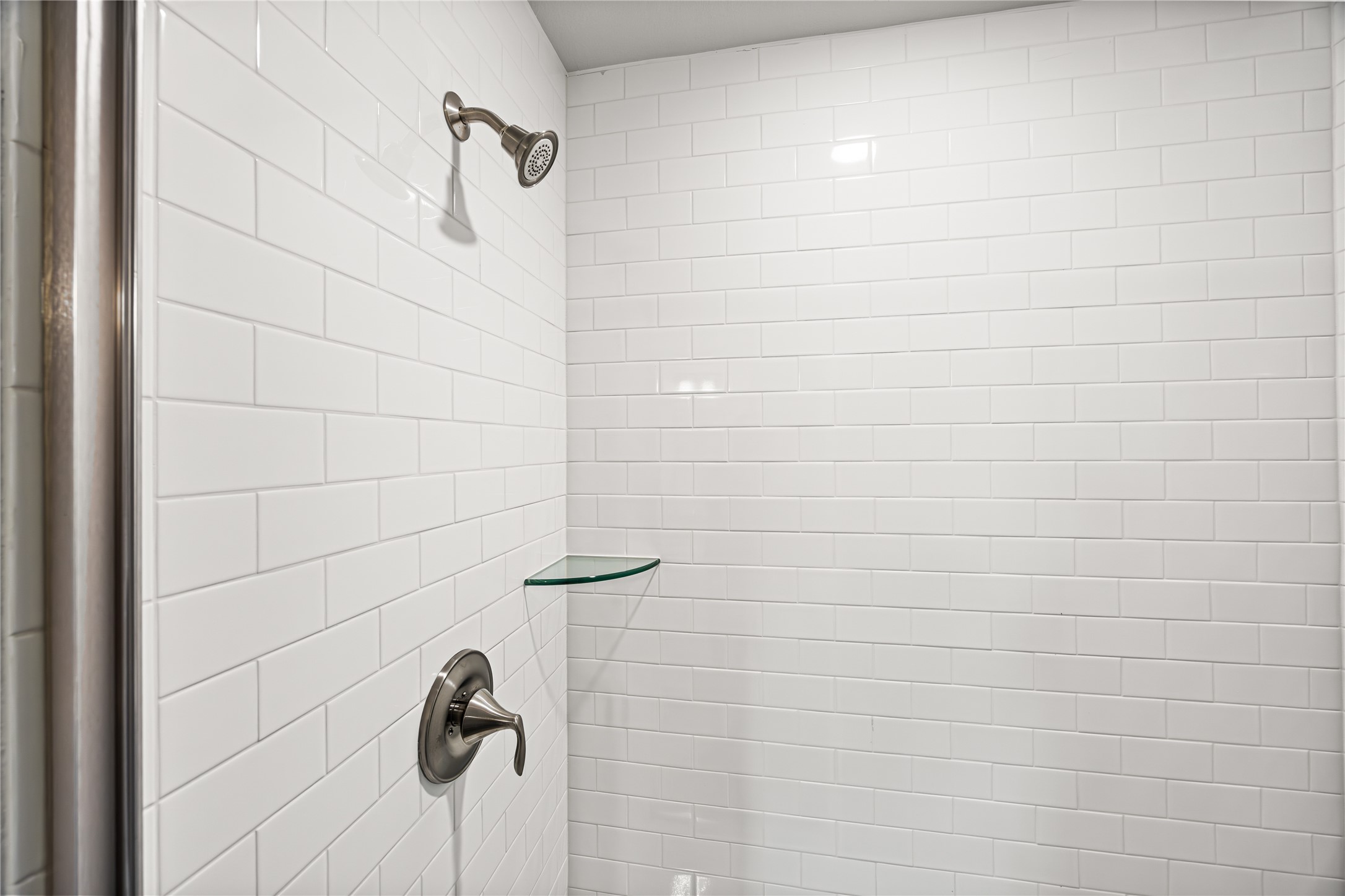 9476 Hard Rock Road Conroe, TX 77303 - Photo 9 of 13 a bathroom with a shower