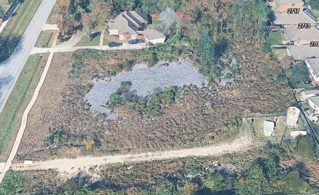 Tbd Mills Branch Road Kingwood, TX 77345 - Photo 4 of 9 a view of a yard with plants and large trees