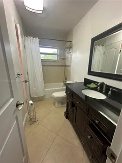 a view of an empty room with windows