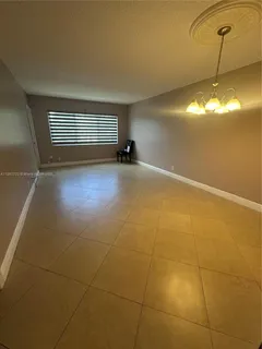 a view of a livingroom with a staircase
