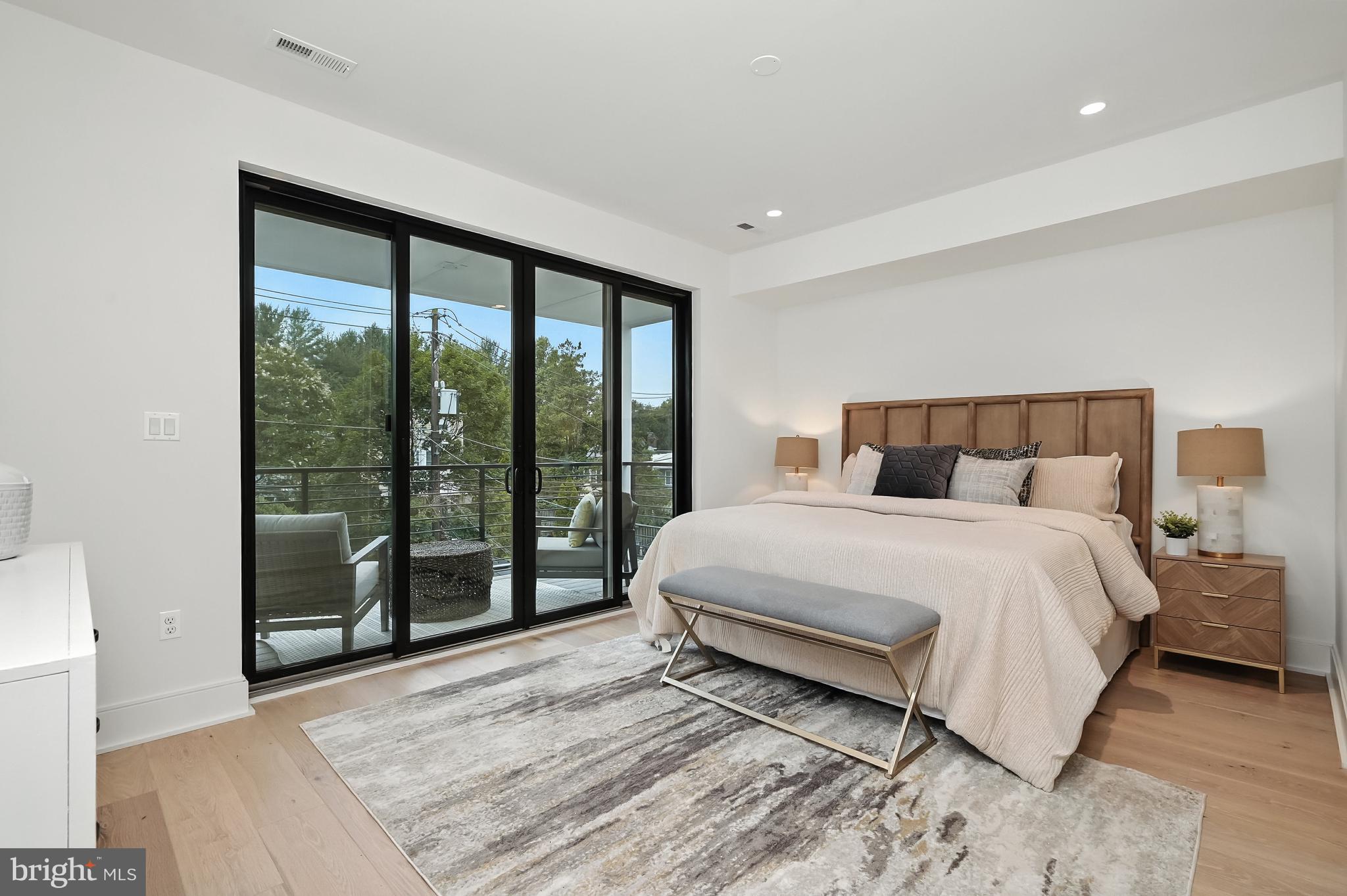 3622 S Street Northwest Washington, DC 20007 - Photo 17 of 53 Upper level 1 primary bedroom w/ covered deck