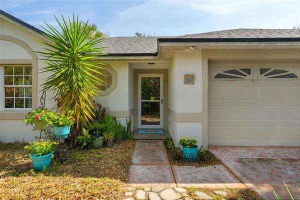 a front view of a house having yard
