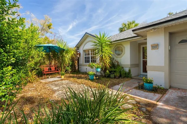 a view of an outdoor space with a tree