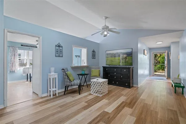 a bedroom with furniture and a window