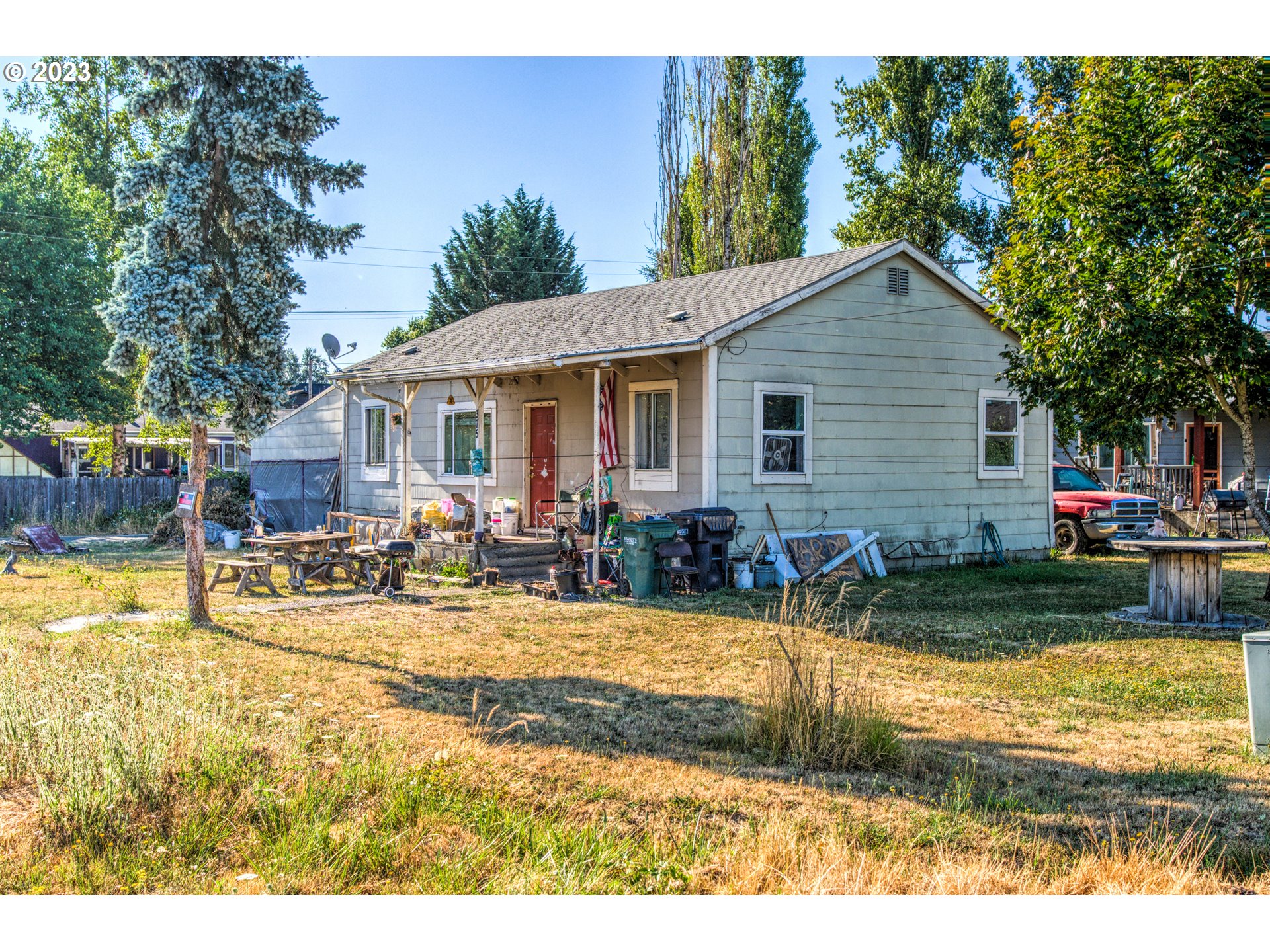 375 Picture Street Independence, OR 97351 - Photo 1 of 5 a view of a house with swimming pool and sitting area