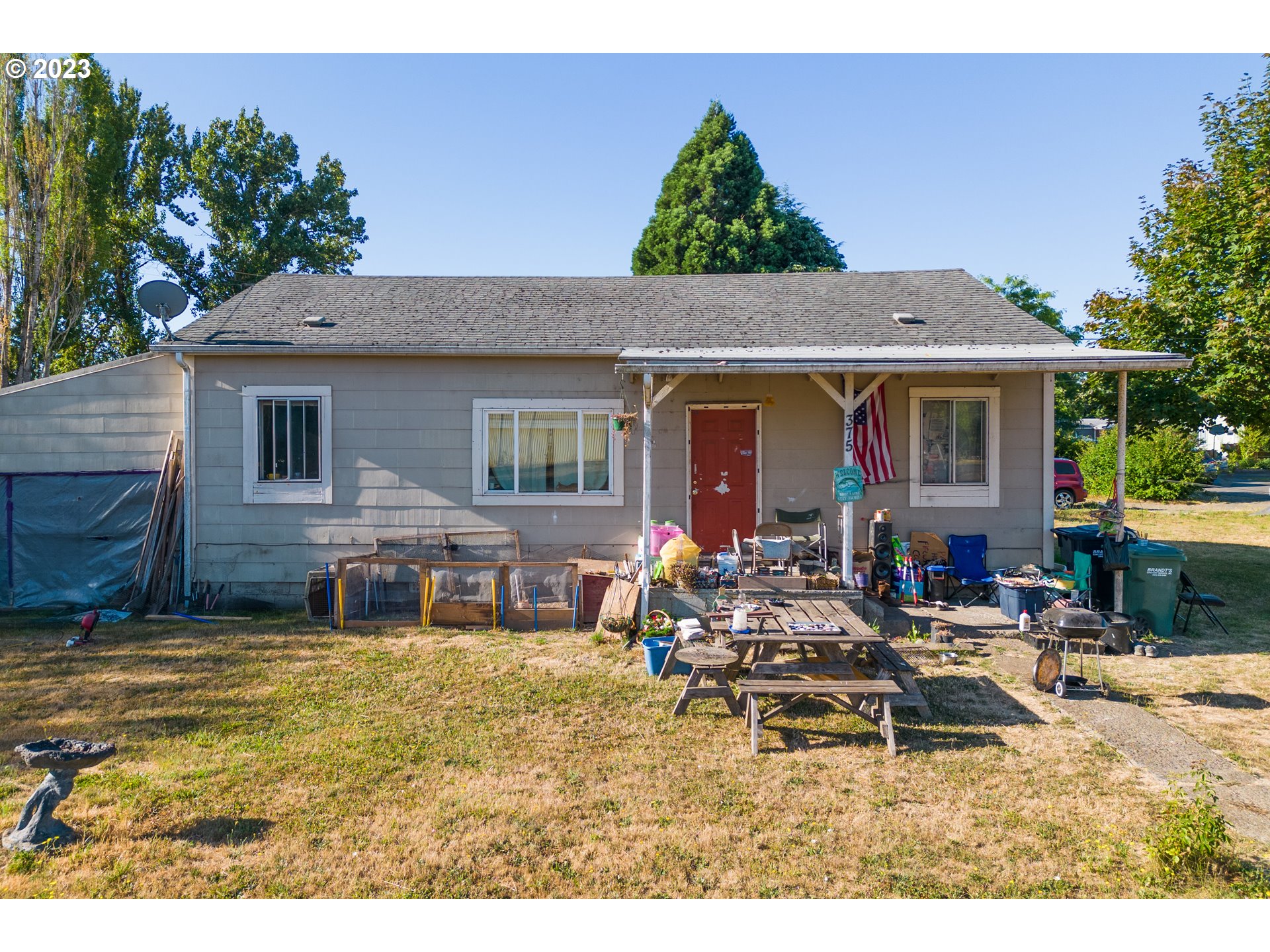 375 Picture Street Independence, OR 97351 - Photo 3 of 5 a view of house with outdoor seating