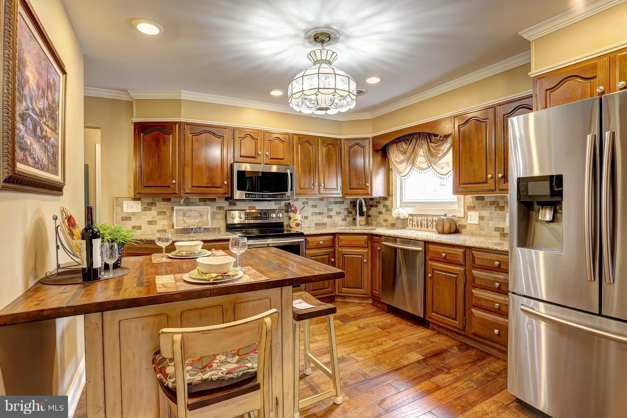 100 Oakmere Road Owings Mills, MD 21117 - Photo 16 of 38 Kitchen equipped w/ SS appliances