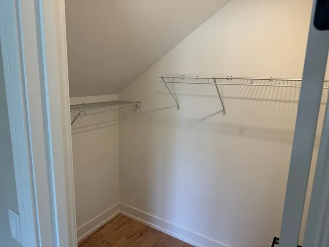 a view of a room with racks on the wall