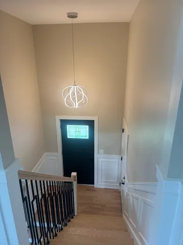 a view of a hallway with entryway