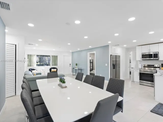 a view of a dining room with furniture
