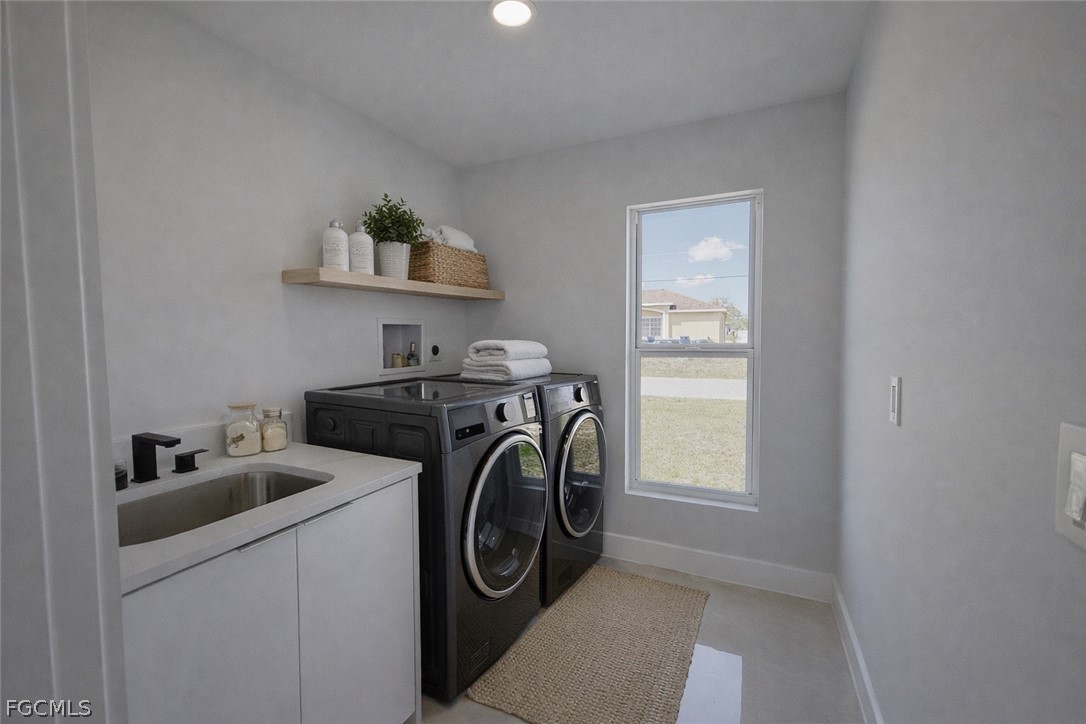 4529 18th Street Southwest Lehigh Acres, FL 33973 - Photo 19 of 50 a utility room with dryer and washer