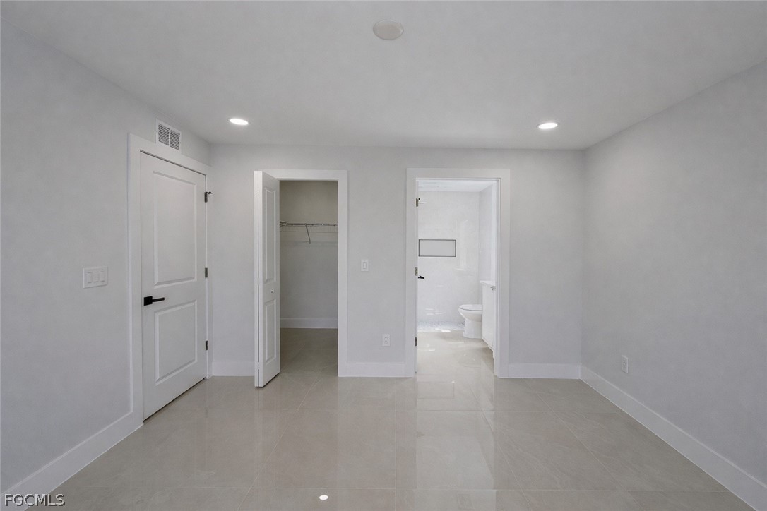 4529 18th Street Southwest Lehigh Acres, FL 33973 - Photo 37 of 50 a view of an empty room