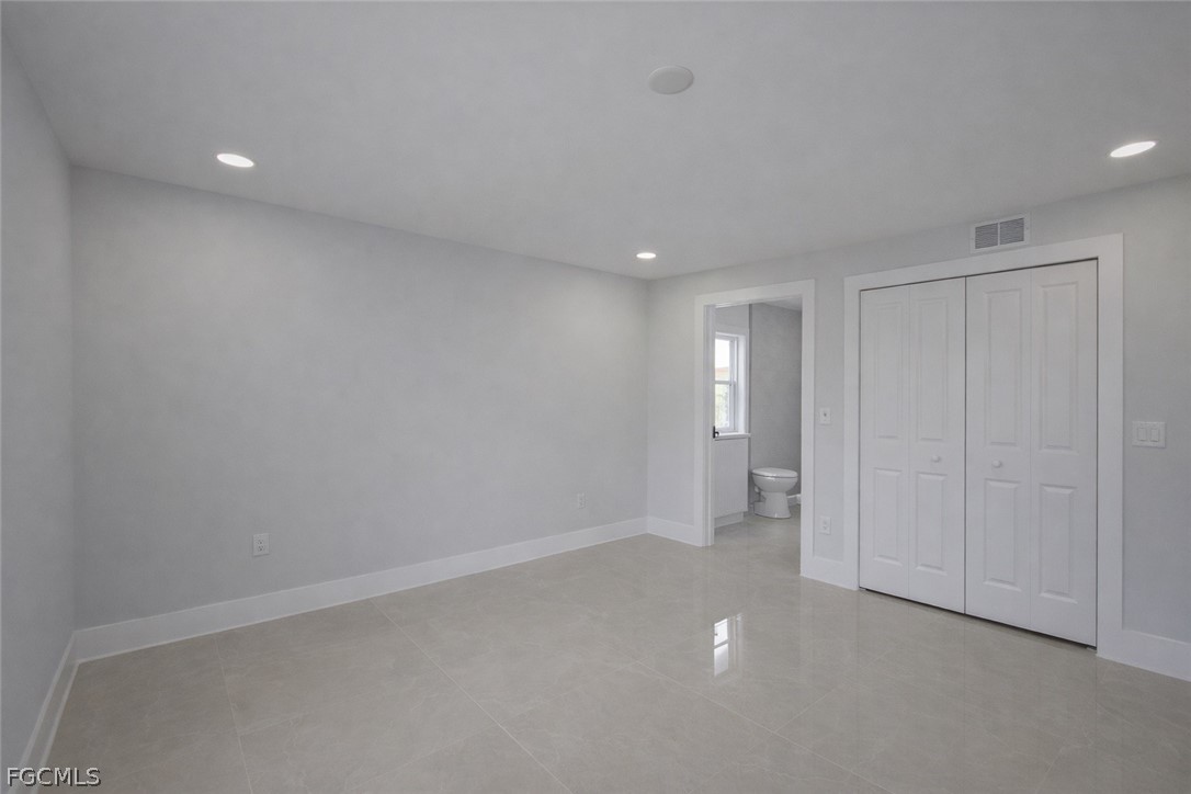 4529 18th Street Southwest Lehigh Acres, FL 33973 - Photo 10 of 50 a view of an empty room