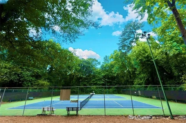 a view of yard with swimming pool