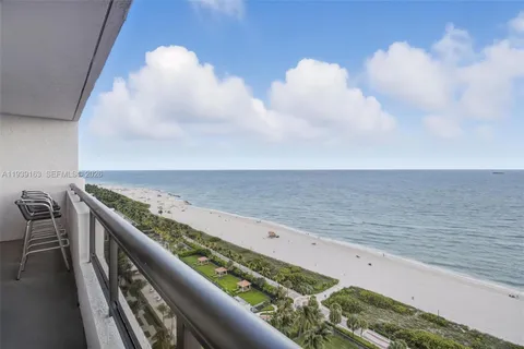 a view of an ocean from a balcony