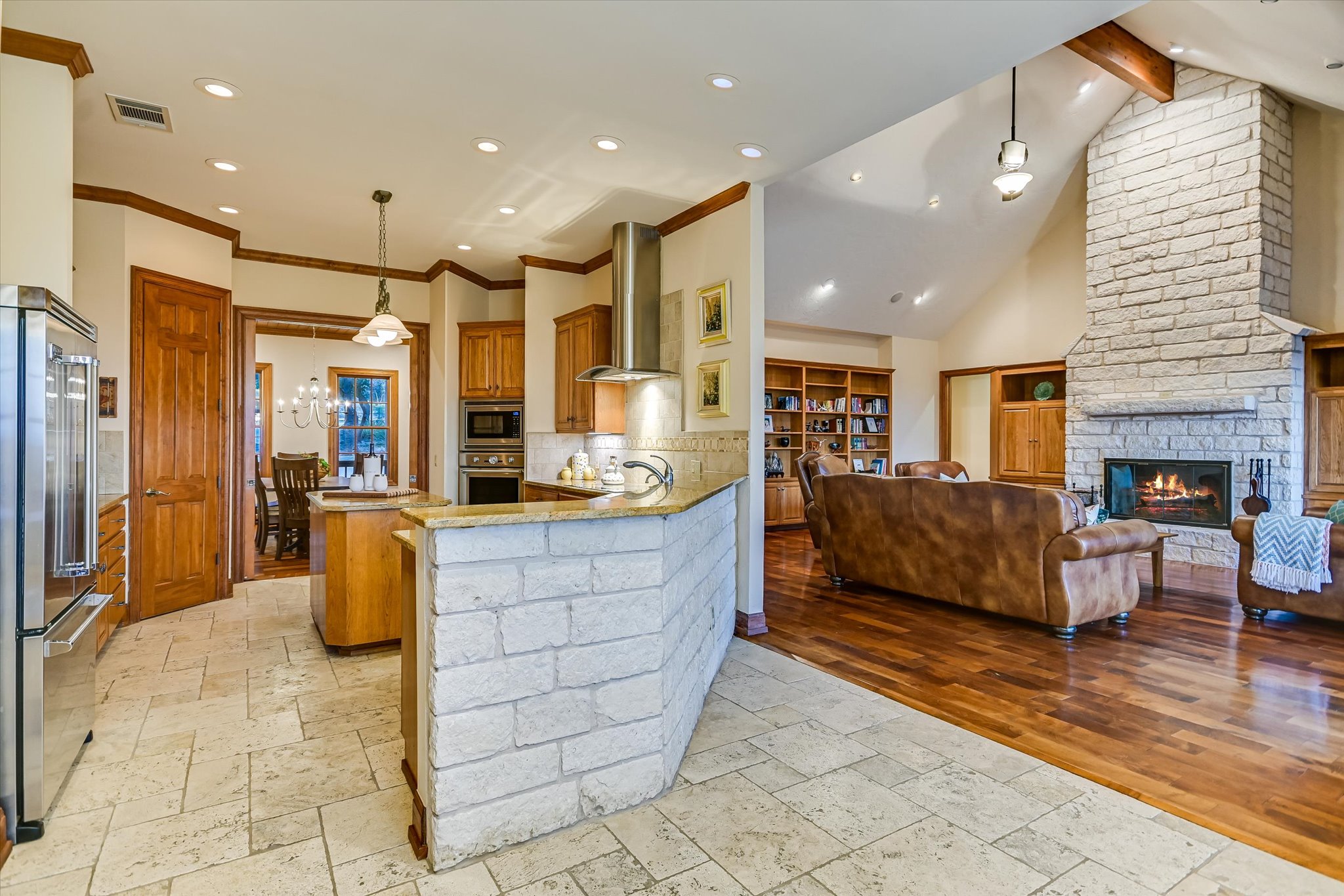 1050 River Mountain Road, Unit A Wimberley, TX 78676 - Photo 11 of 40 a living room with furniture and a fireplace