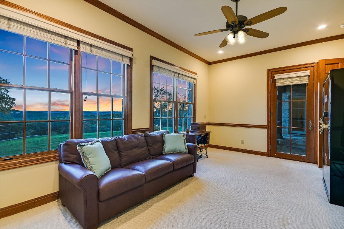 1050 River Mountain Road, Unit A Wimberley, TX 78676 - Photo 16 of 40 a living room with furniture and a large window