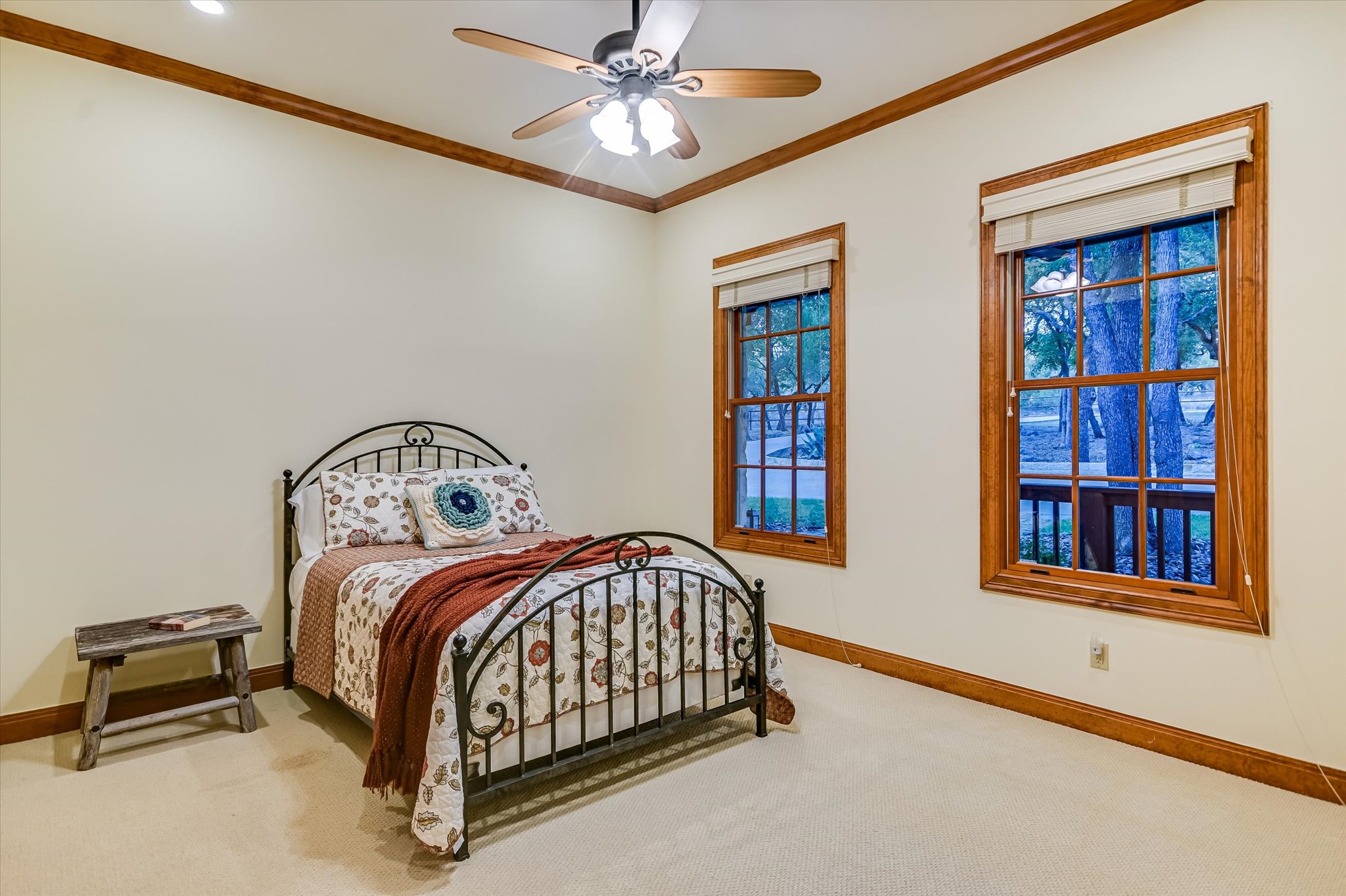 1050 River Mountain Road, Unit A Wimberley, TX 78676 - Photo 21 of 40 a bedroom with a bed and a window