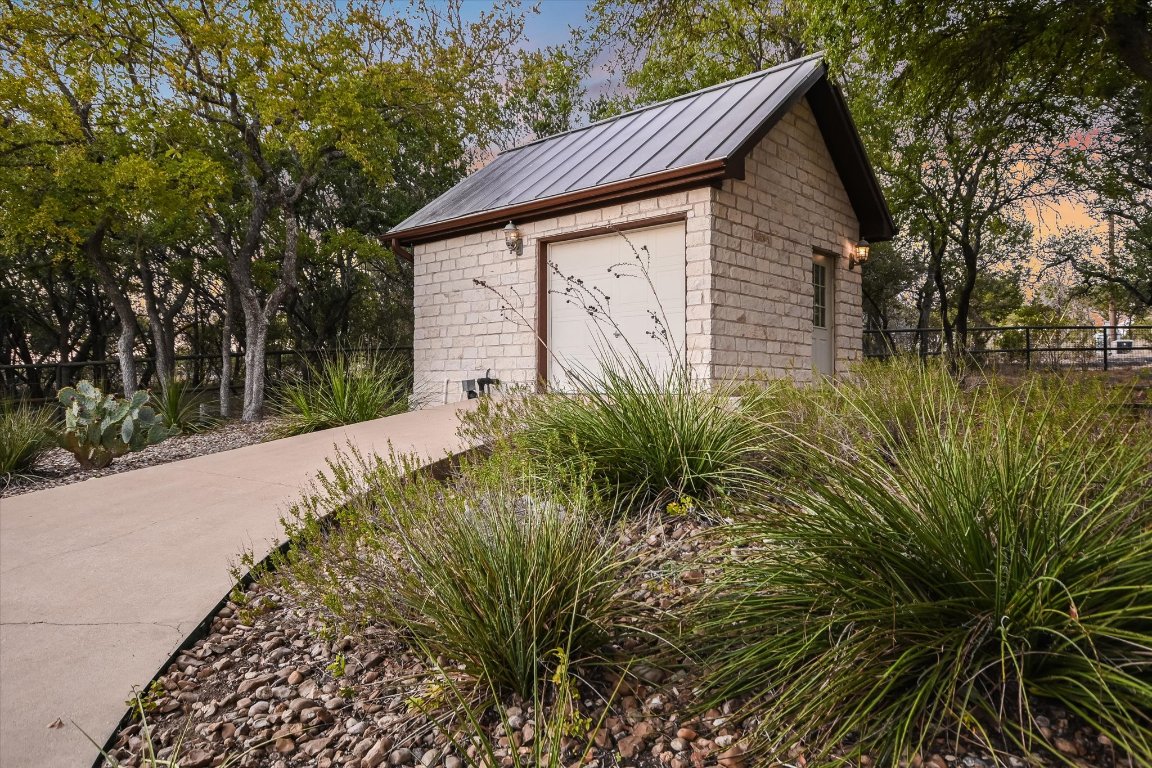 1050 River Mountain Road, Unit A Wimberley, TX 78676 - Photo 29 of 40 a view of a house with a yard