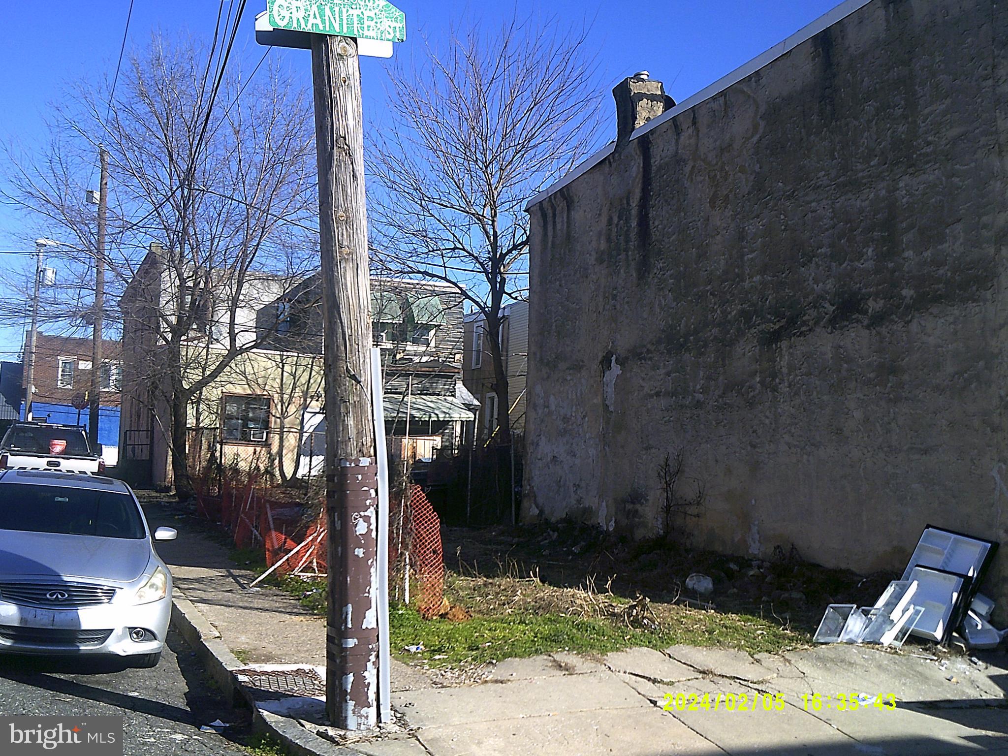 2015 Granite Street Philadelphia, PA 19124 - Photo 2 of 5 a view of a porch with a yard