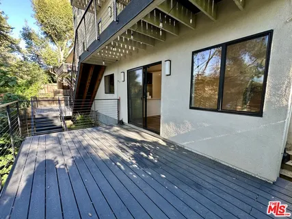 a view of a house with a roof deck