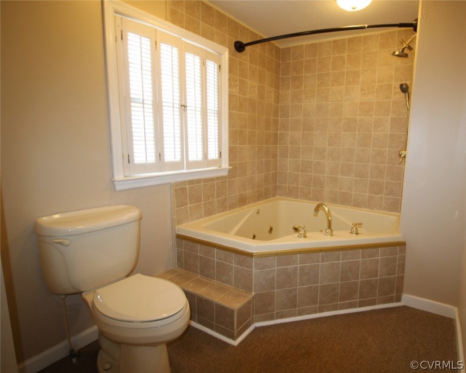 5053 Bell Road Dillwyn, VA 23936 - Photo 15 of 29 a bathroom with a shower and a toilet