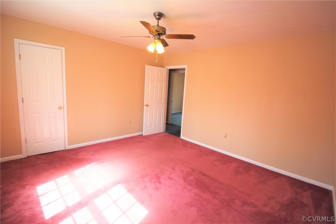 5053 Bell Road Dillwyn, VA 23936 - Photo 16 of 29 a view of a room with a ceiling fan and a window