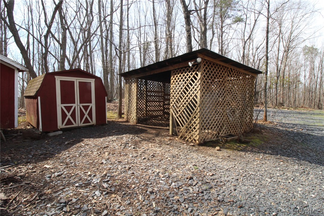 5053 Bell Road Dillwyn, VA 23936 - Photo 24 of 29 a front view of a house with a yard