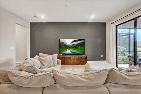 a living room with furniture and a couch
