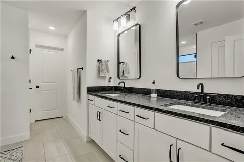 a room with a bed and a shower