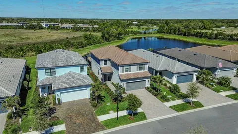 an aerial view of a house with a garden