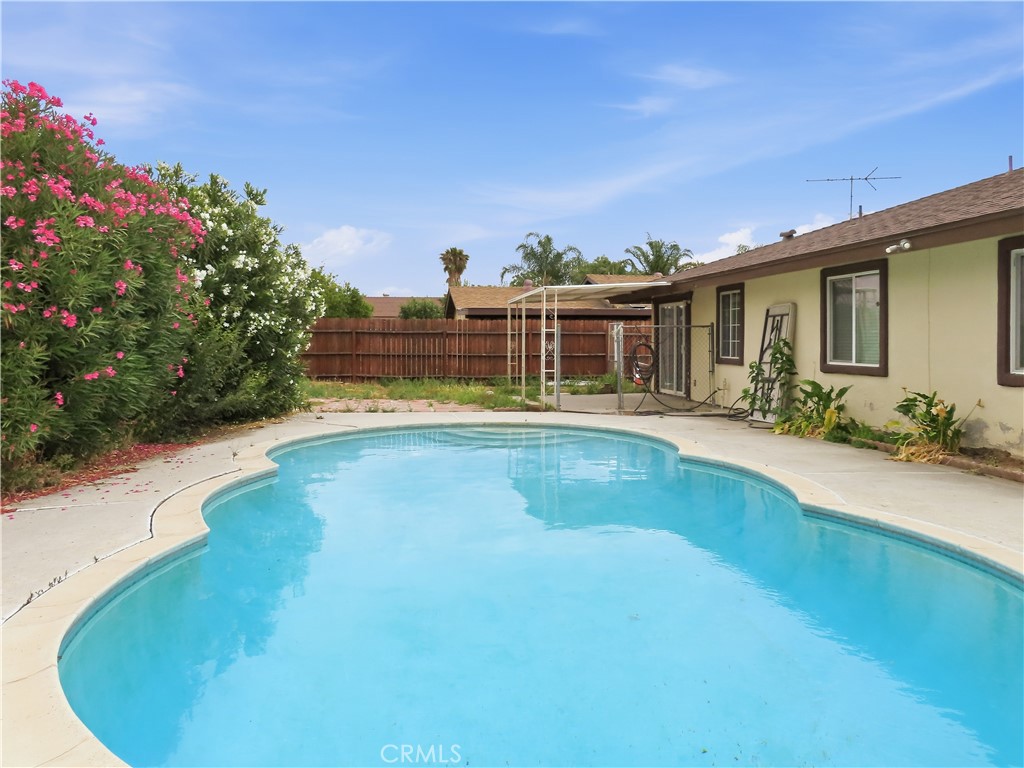 4409 Challen Avenue Riverside, CA 92503 - Photo 27 of 31 a view of a house with swimming pool