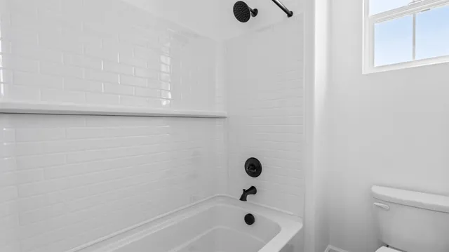 a bathroom with a bathtub