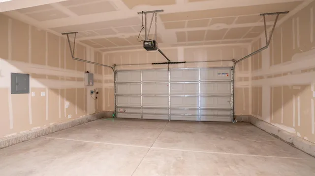 a view of an empty room with a white door