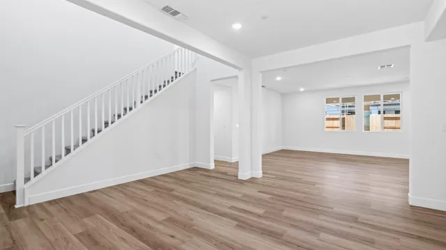 a view of entryway with wooden floor
