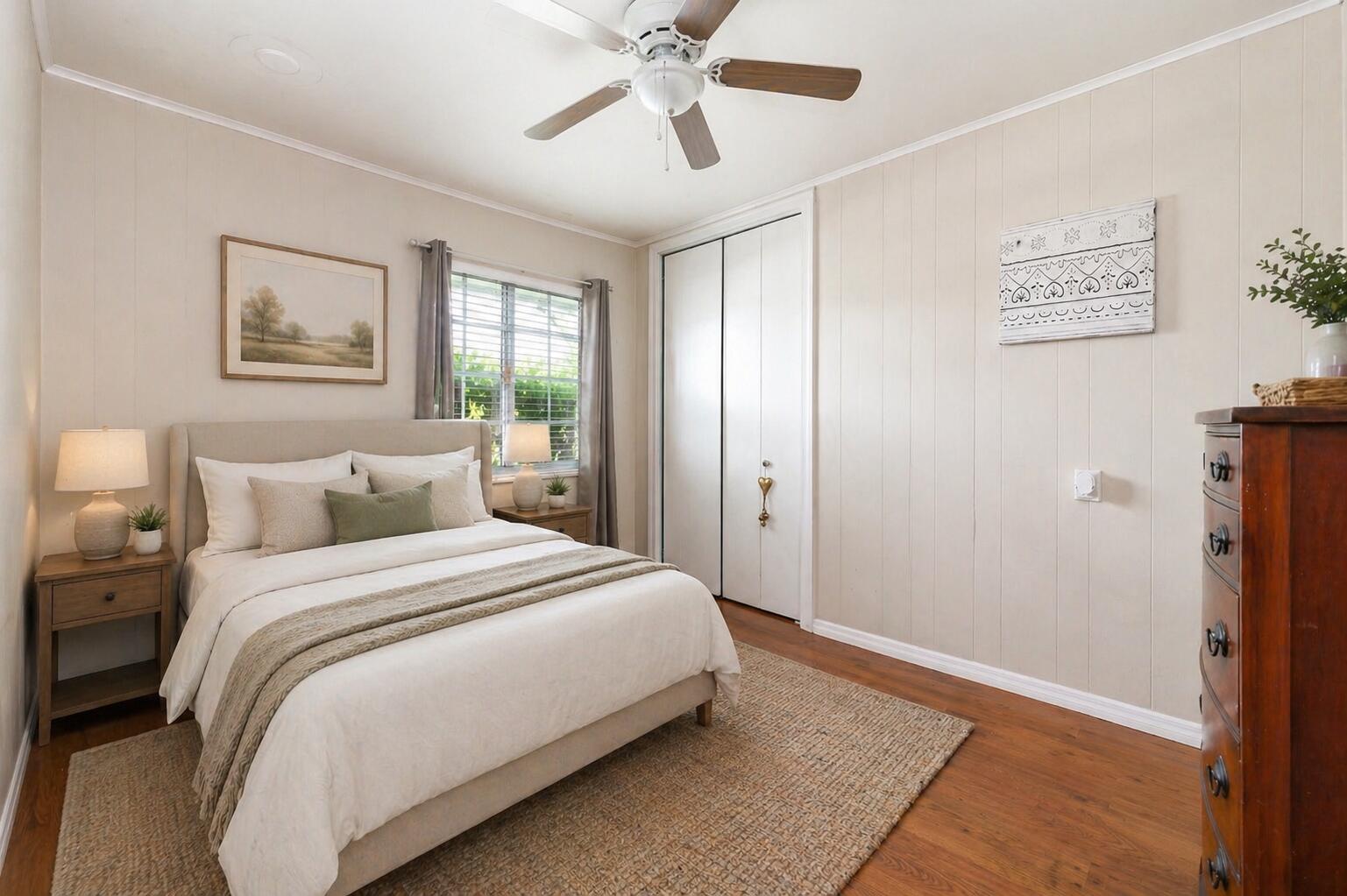 4734 Jefferson Street Hollywood, FL 33021 - Photo 29 of 68 a bedroom with a bed and a painting on the wall
