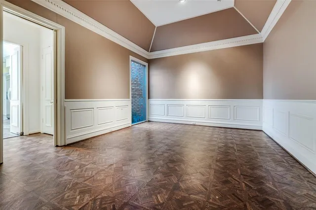 a view of an empty room and window